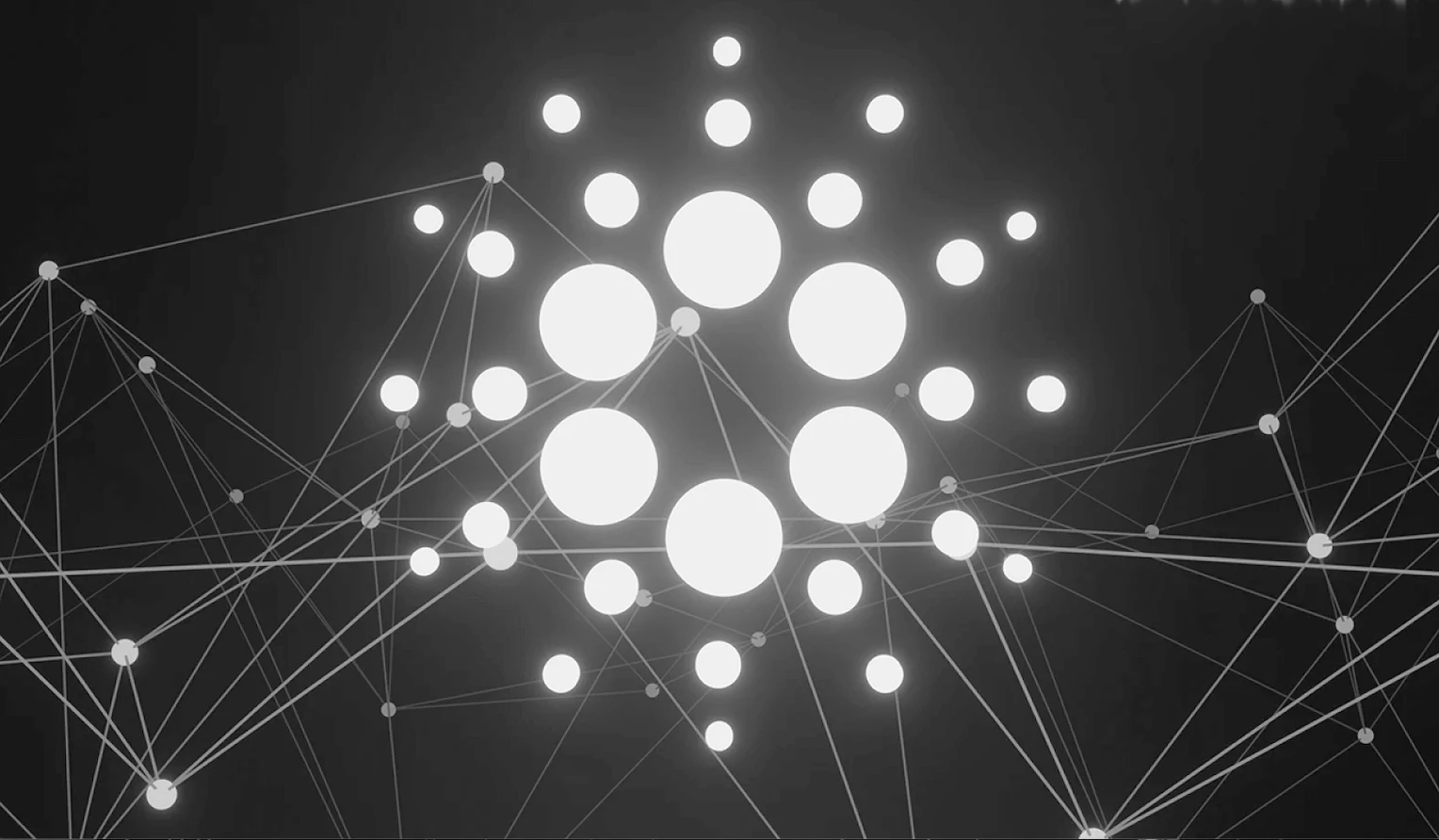 A black and white image showing an abstract representation of a network with interconnected nodes and lines, with several larger circles grouped in the center, forming the Cardano logo. The design suggests connectivity and complexity.